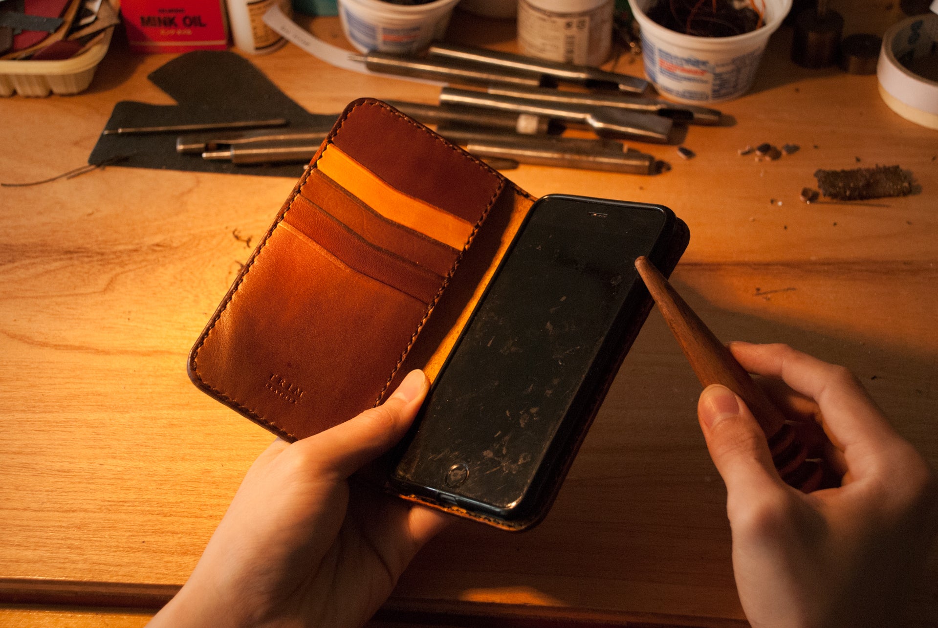 Making a leather wallet.