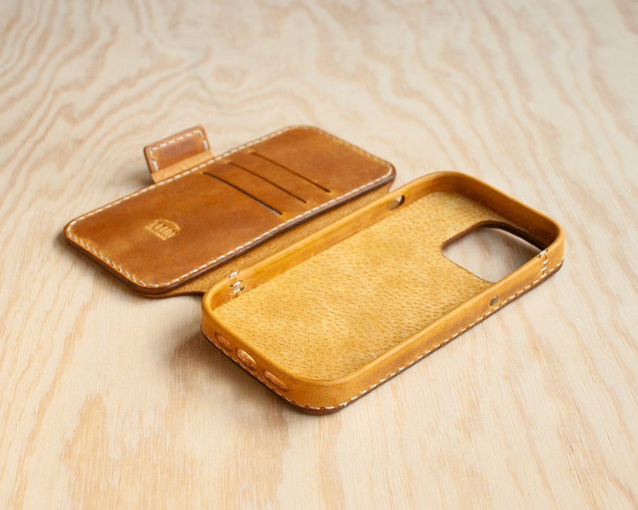 TRIM Honey leather iPhone wallet folio, lifestyle shot