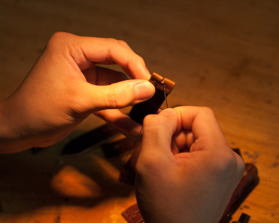 TRIM leather craft, hand-stitched studio close-up