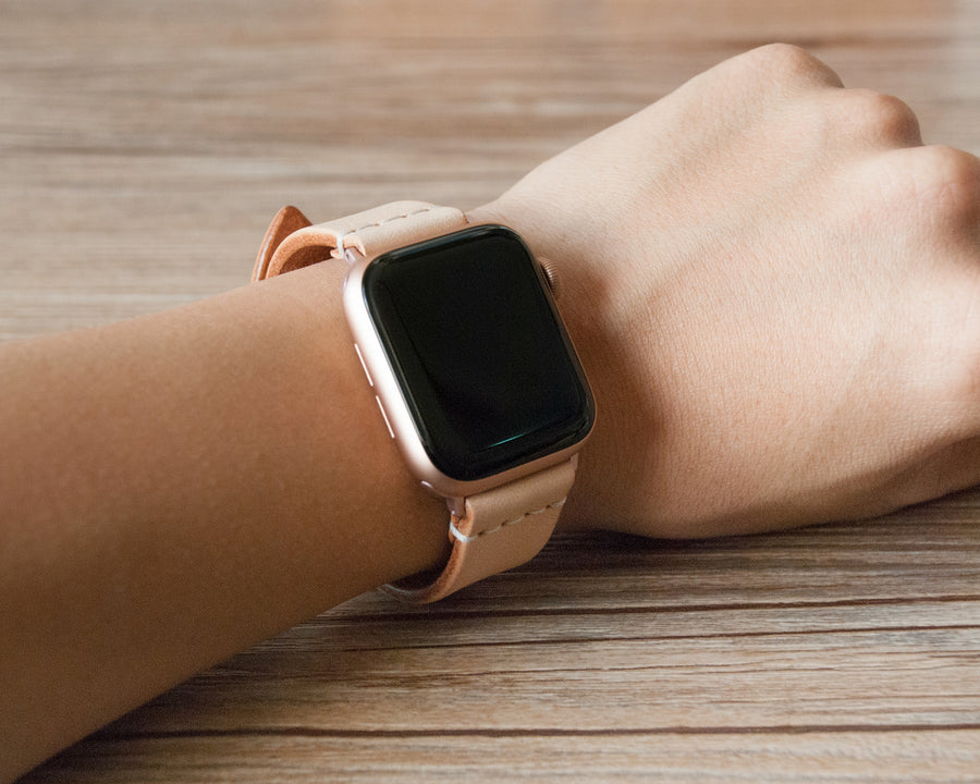 Natural veg-tanned leather Apple Watch band, close-up studio shot
