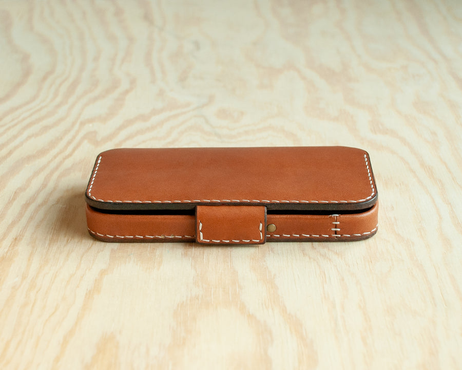 TRIM Saddle leather iPhone wallet folio, interior view