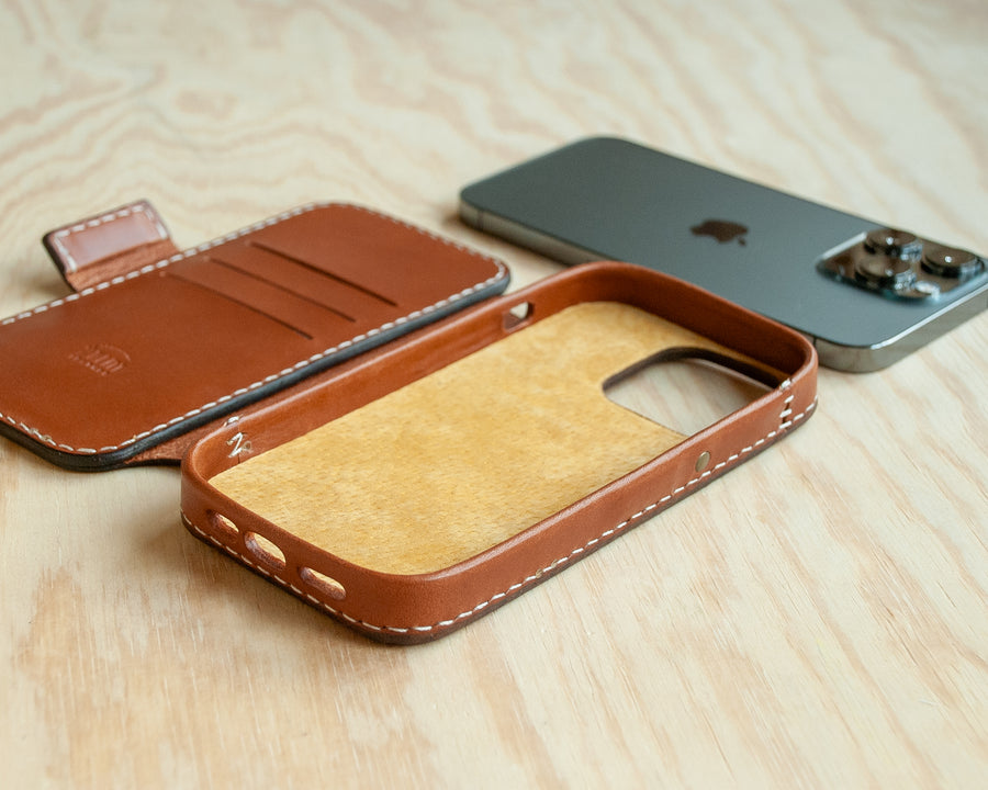 TRIM Saddle leather iPhone wallet folio, lifestyle shot