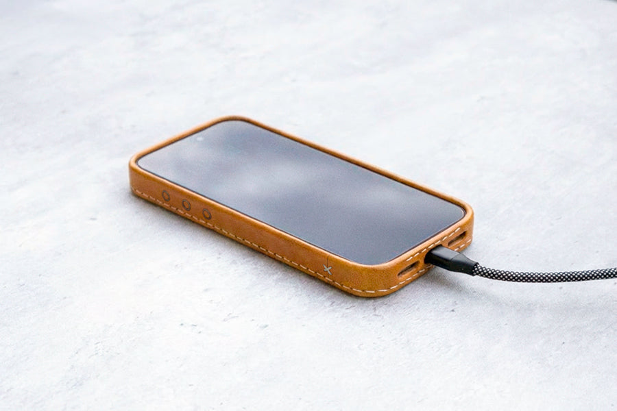 Honey oil-waxed leather iPhone case by TRIM, studio detail