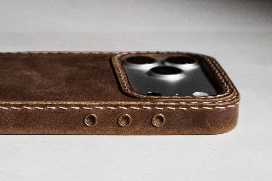 Walnut leather iPhone case action button side cutout detail