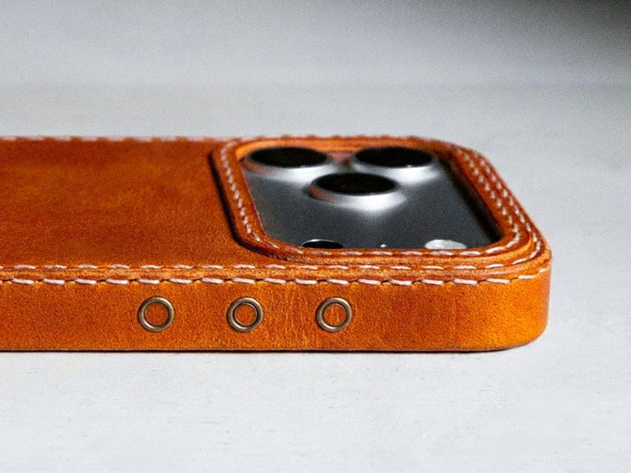 Ember oil-waxed leather iPhone case, TRIM studio flat lay