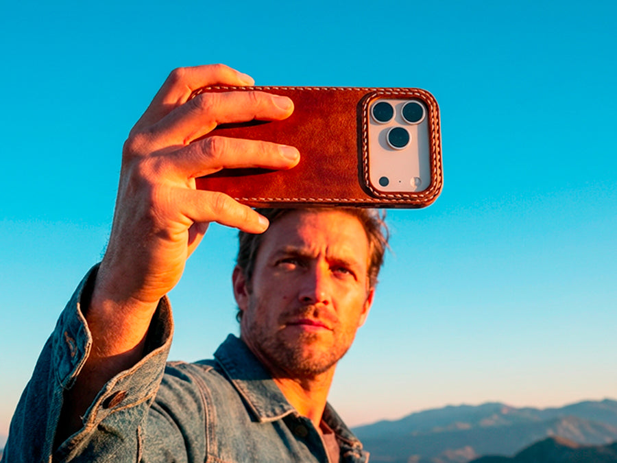 TRIM Ember leather iPhone case in outdoor setting