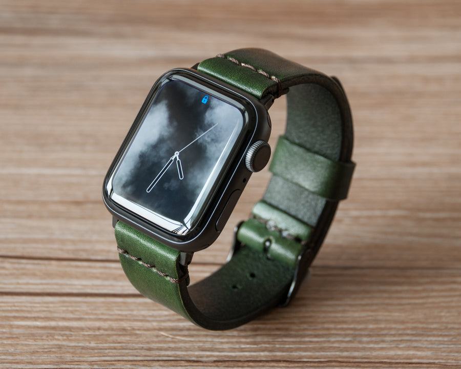 Emerald oil-waxed leather Apple Watch band, studio flat lay